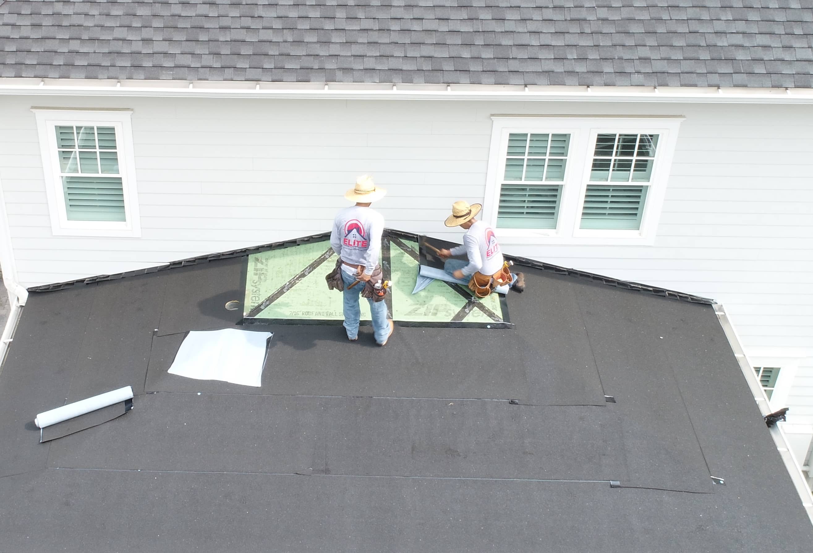 Why You Should Buy an Elite Roof 1 Elite Team Working on Roof 1