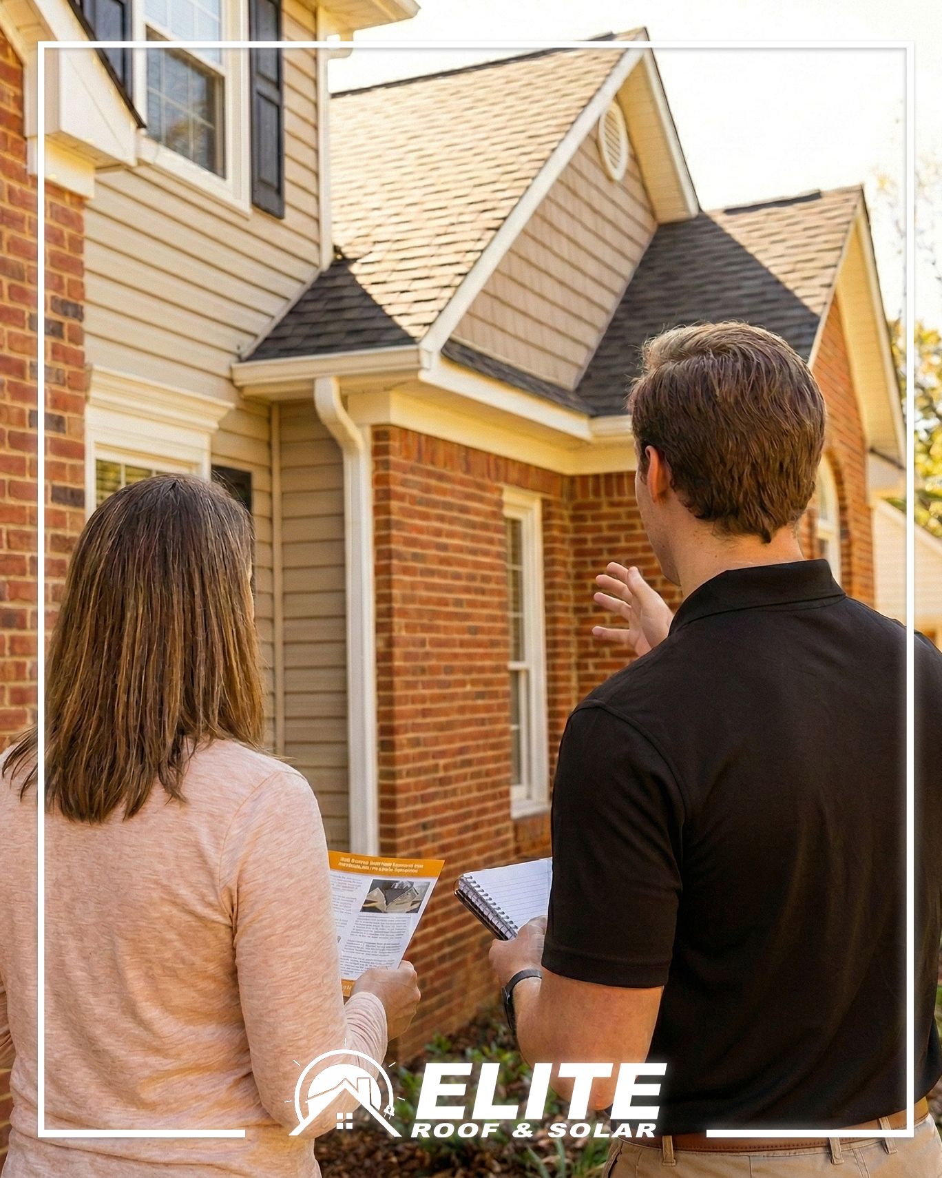 Roofing contractor reviewing paperwork with a homeowner, a key step in an insurance claim for roof replacement